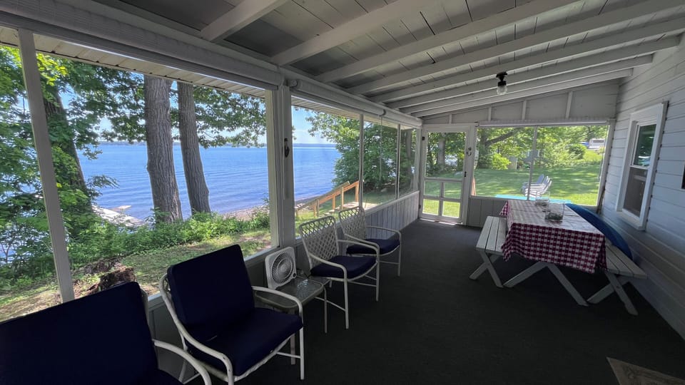 Large screened-in porch to relax on overlooking the lake