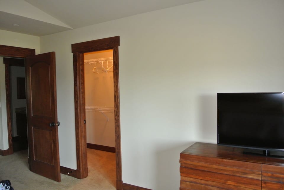 Upstairs master bedroom TV and closet