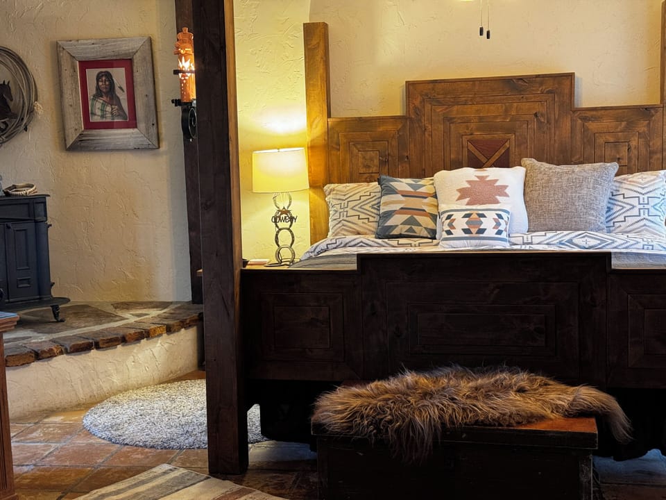 Large Master (West) with King bed and en suite shower.
