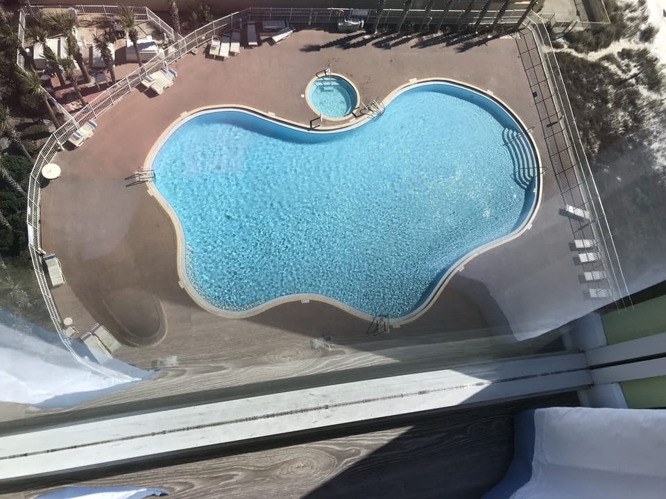 Winter view of Pool from the Unit
More chairs around pool in Spring & Summer