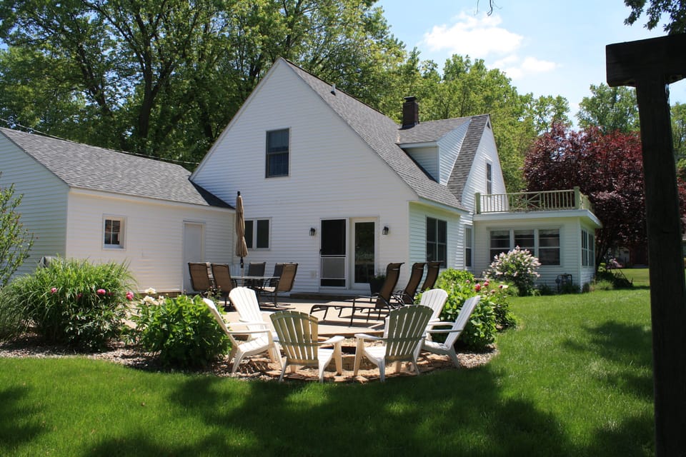 Large back patio with gas grill and gas fire pit (no firewood); water hose.