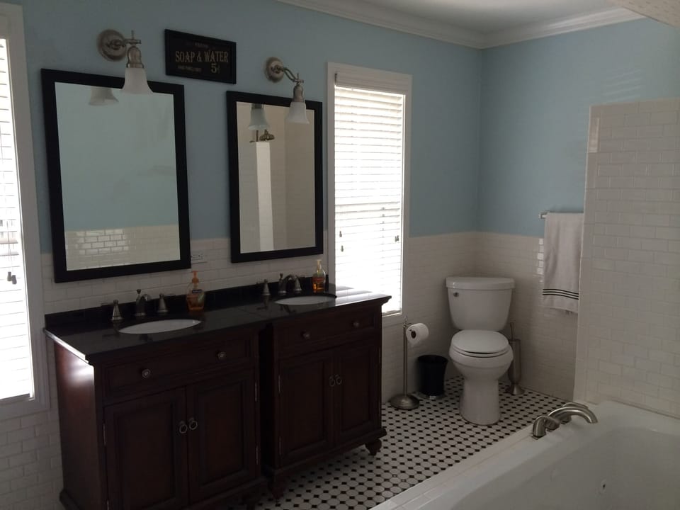 Upstairs bathroom, double vanities, shower, spa tub