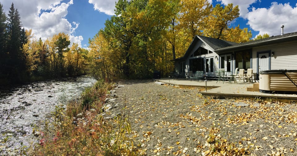 Rear Patio with View of Hot Tub and Rock Creek