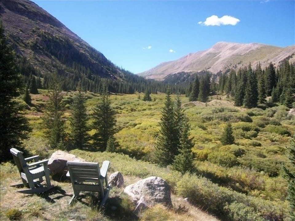 Relax in the rockers listening to the creek after a fun day.
Come stay with us!
