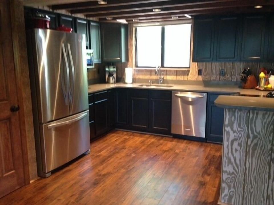 Kitchen: quartz counter tops, new appliances, convenient layout for gatherings.