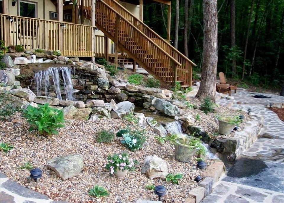 Waterfall and upper patio with firepit