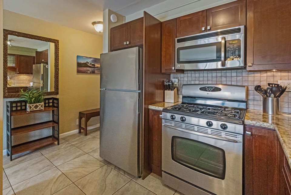 A full suite of stainless appliances and granite counters means you can cook fresh catch or just brew another pot.