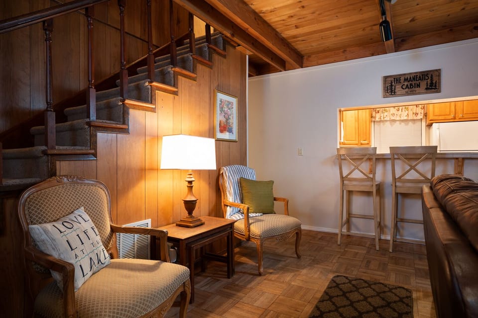 This small seating area offers a cozy spot to relax and unwind, perfect for enjoying a quiet moment or a good book