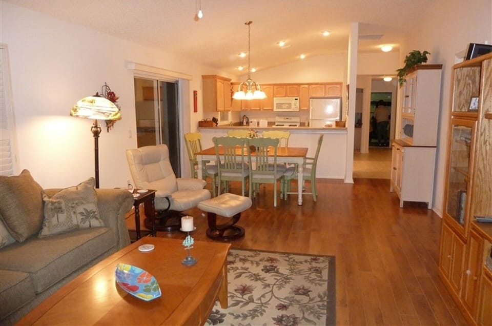 Living room, followed by Dining room and Kitchen