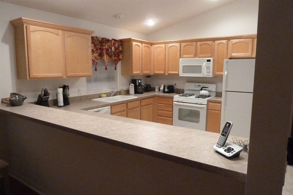 Open kitchen with bar area adjoining