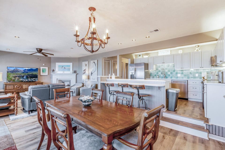 Views of dining area, kitchen and sitting area.  