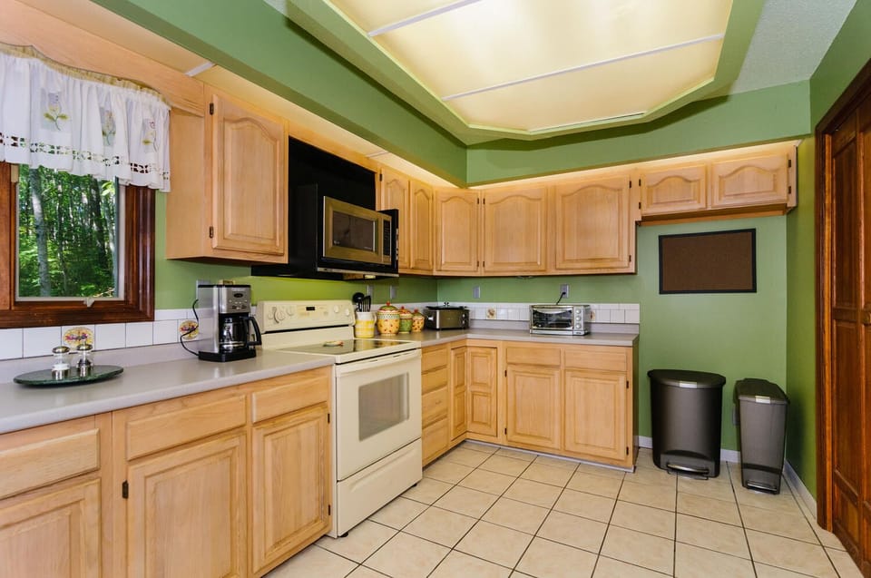 Fully equipped kitchen with stocked pantry.