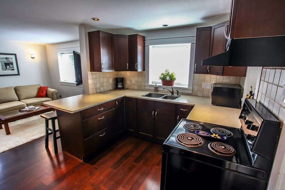 Kitchen with in suite laundry and dishwasher