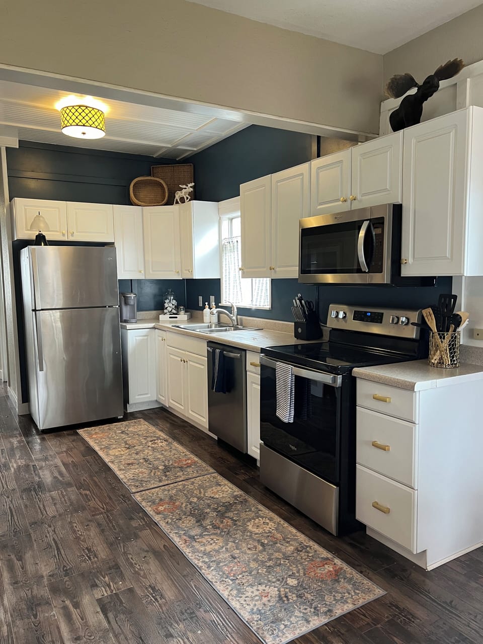 New stainless appliances and fully stocked kitchen.