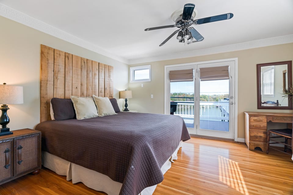 Master Bedroom with private deck and view of lake