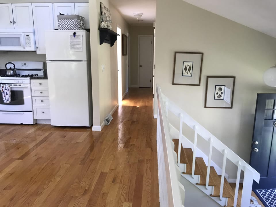 kitchen area leading to 3 bedrooms 
