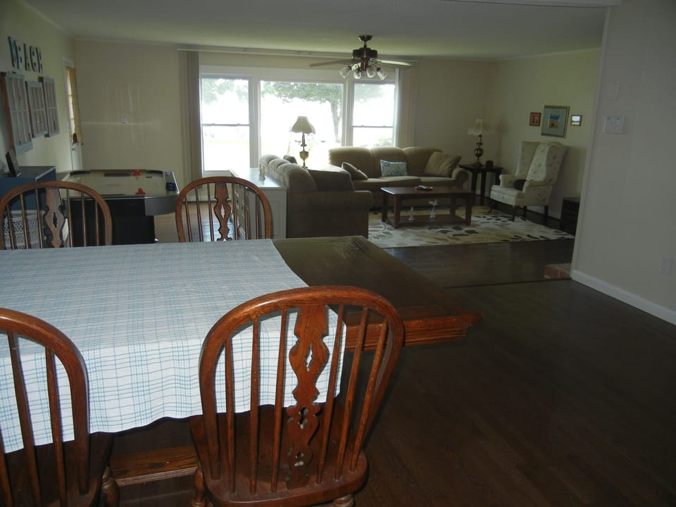 Open floor plan from kitchen, dining room and living room.