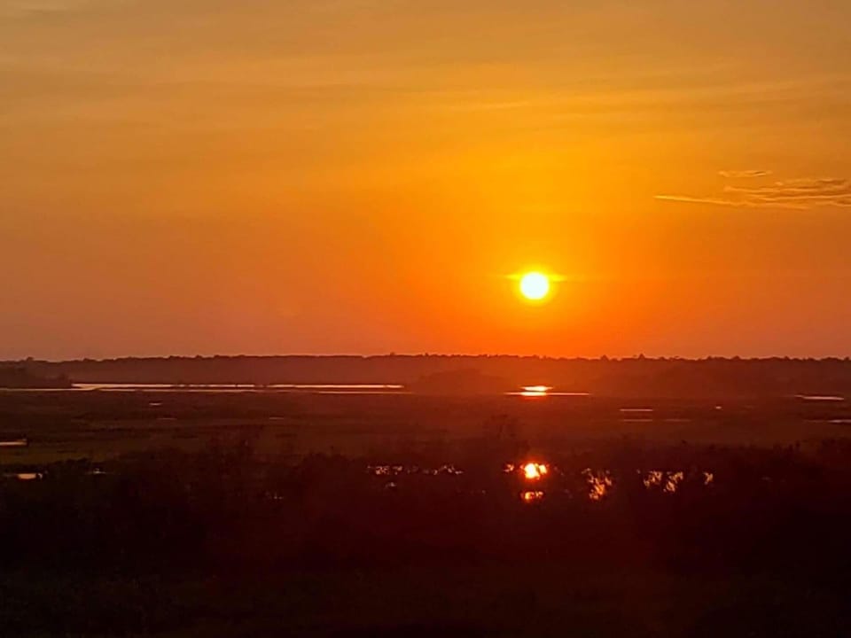 Sunset from our deck on the sound.