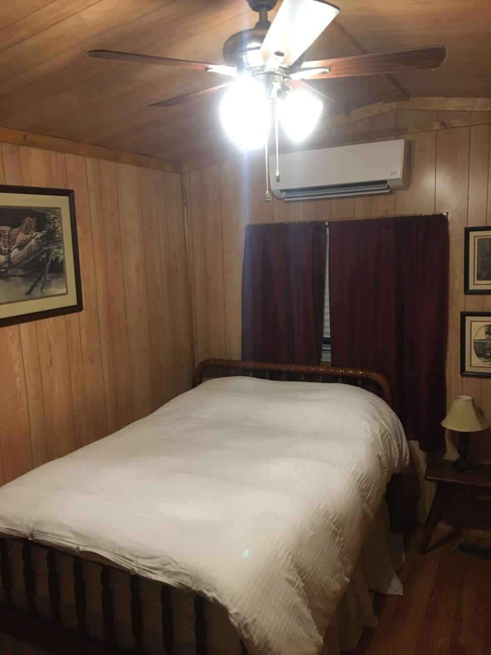 master bedroom with a full bed.