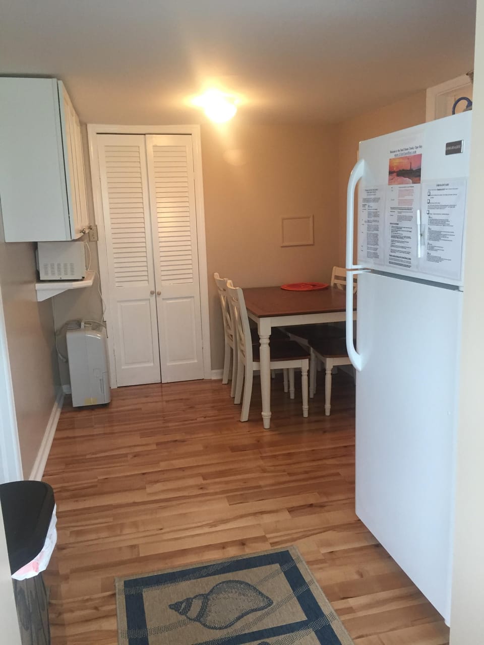 Kitchen.  Includes seating for 4, microwave and toaster. Pantry for storage.