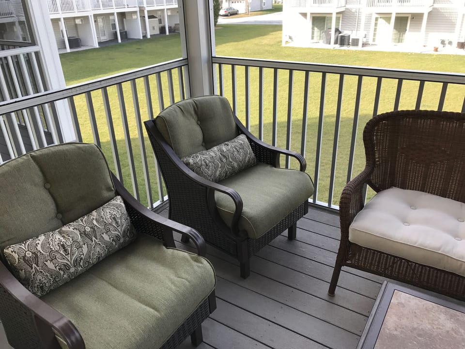 Enclosed porch off of living room.