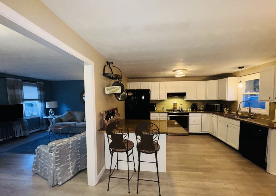 Eat in kitchen. Table seats 8. Island seats 2. 

Island seats 2.