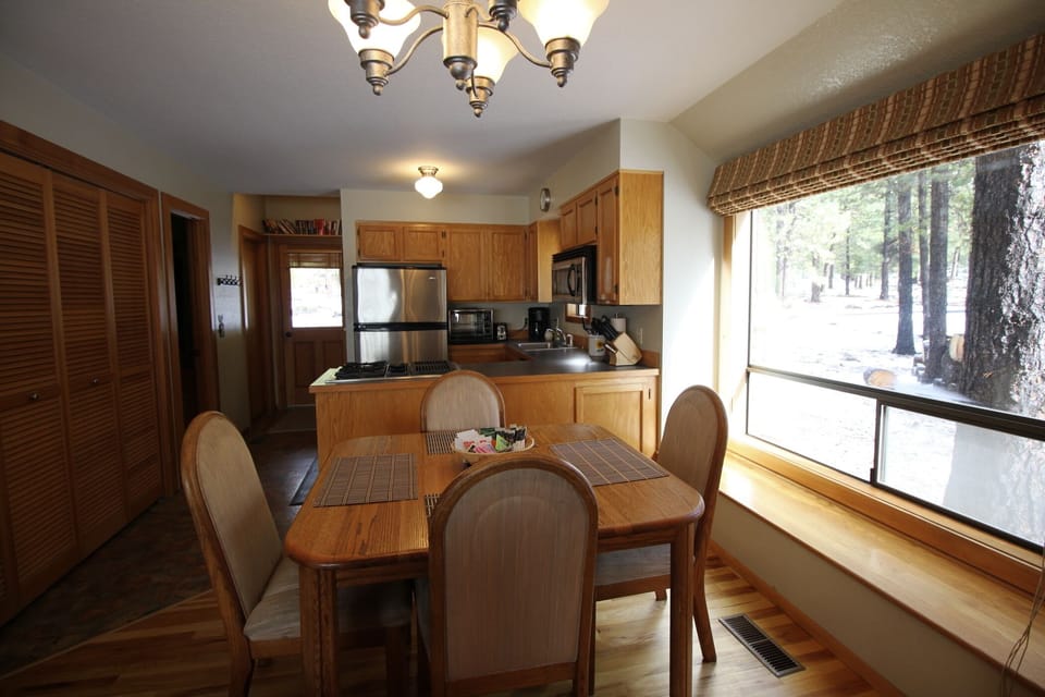 Dining room to kitchen and front door (newer table not pictured).