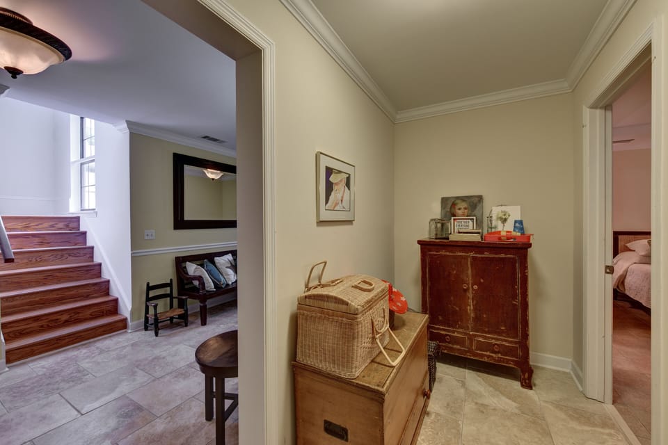 Entry to downstairs guest bedrooms and stairs leading to main floor