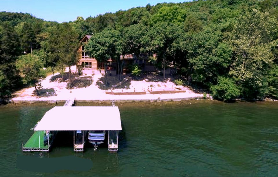 Lakeside view of Log Home and Dock