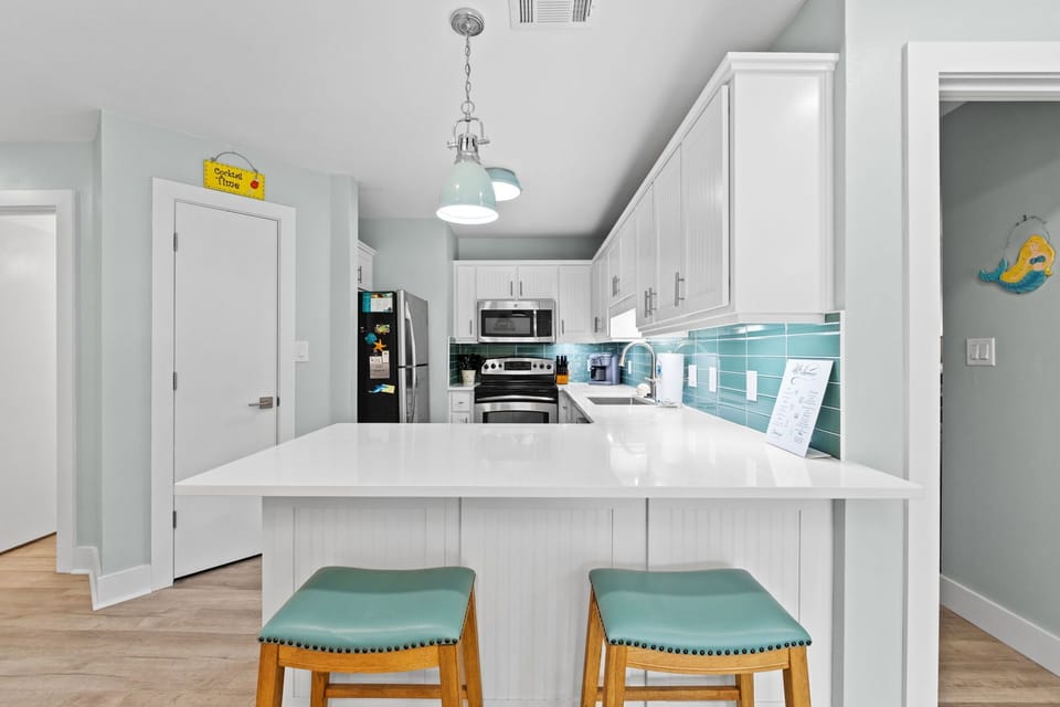 Barstools to watch the chef's hard at work