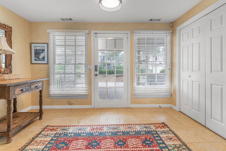 Front entrance foyer that opens to main living room and staircase