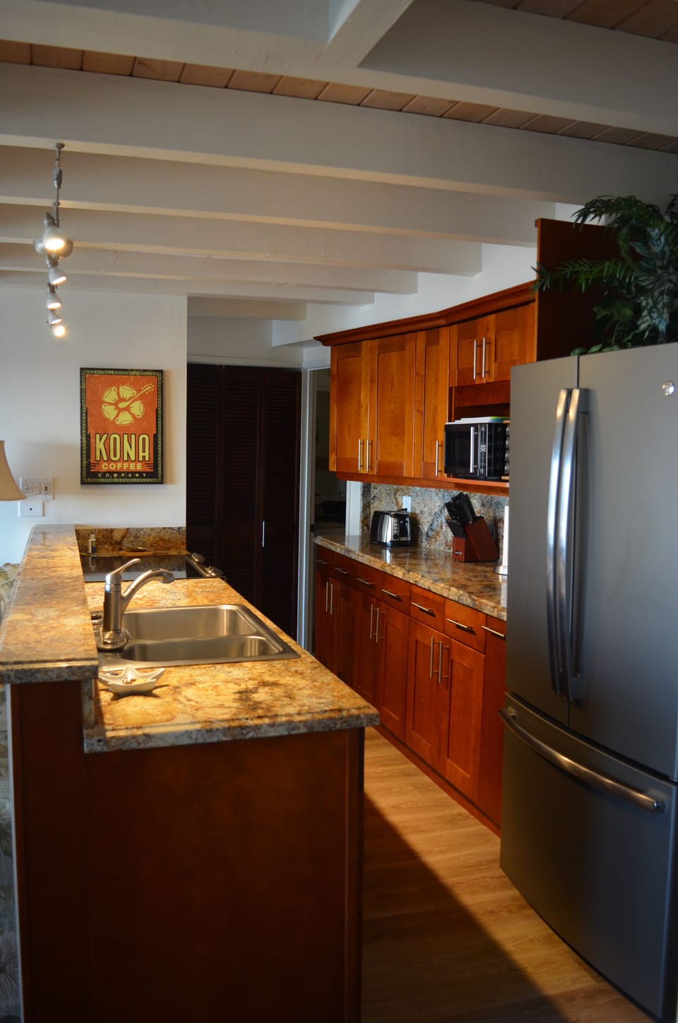 view of kitchen as you enter the condo
