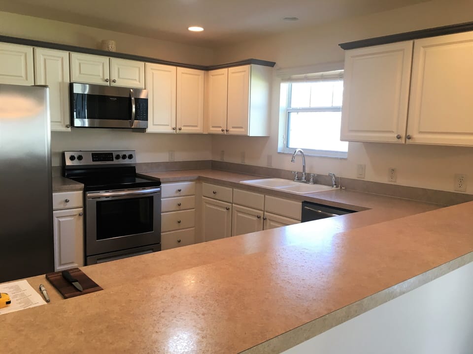 Kitchen with open pass thru area