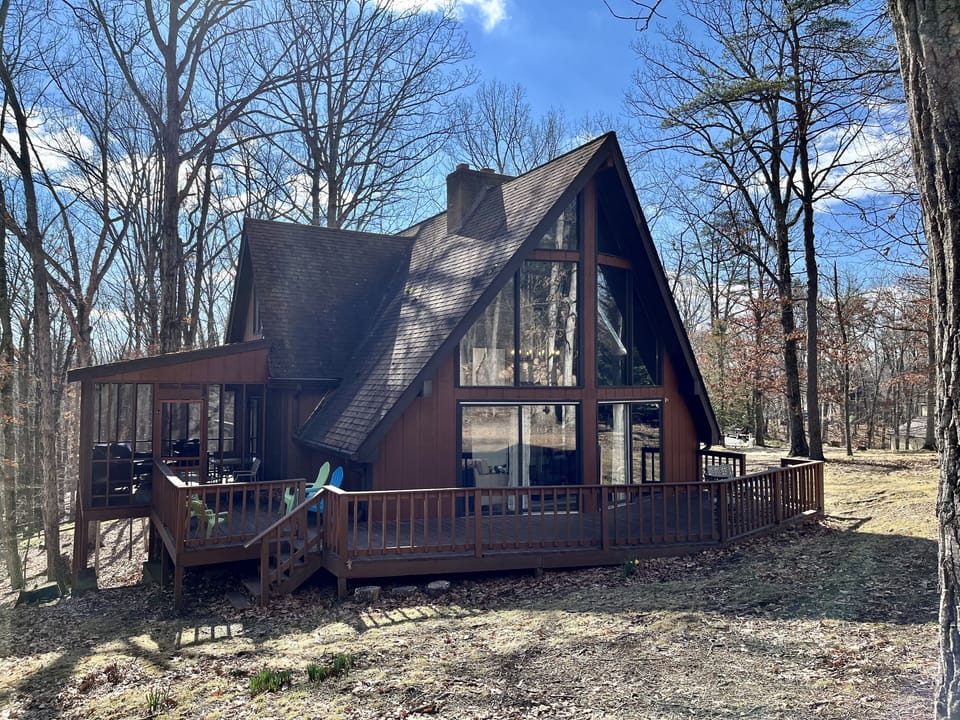 Wrap around deck faces the woods where you can spot wildlife. 