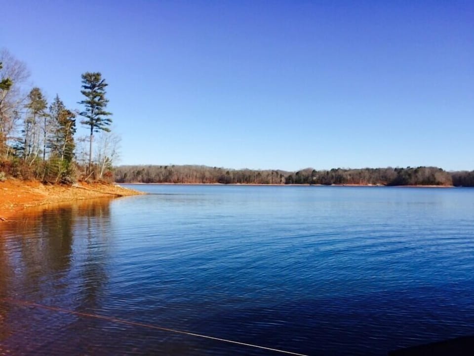 Glass-like deep water from dock just tucked into the cove for peaceful waters