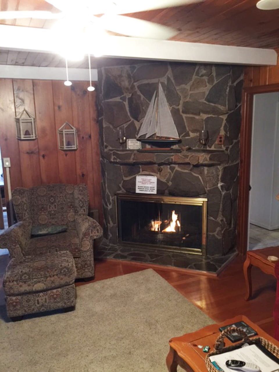 River rock fireplace. Very comforting and warm in the winter.