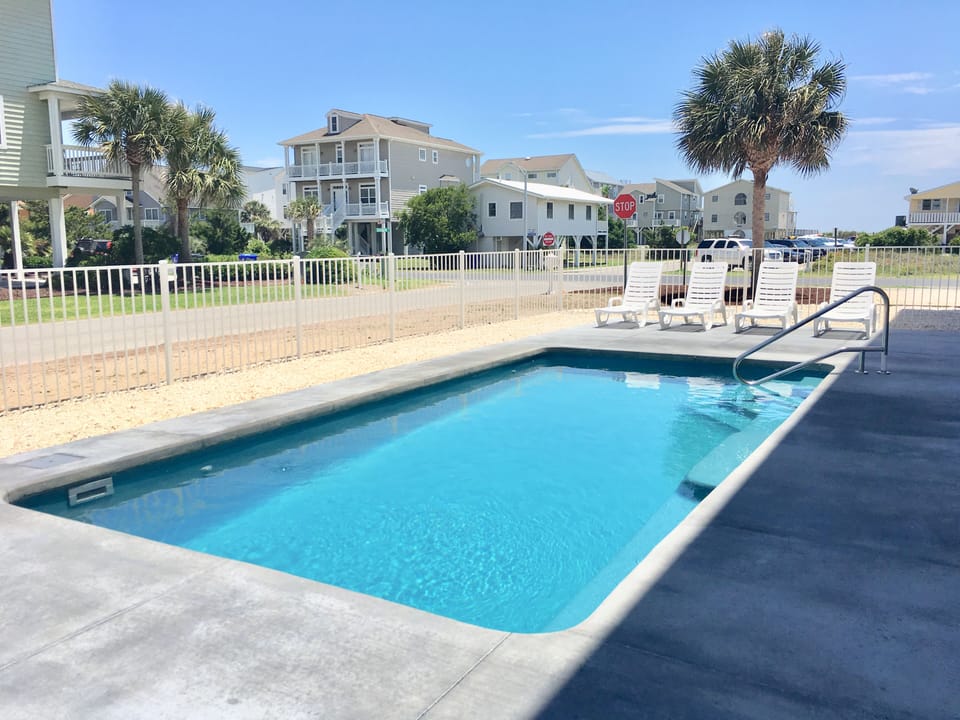 12X24, Fiberglass, Salt Water Pool. Professionally Maintained w/4 Lounge Chairs