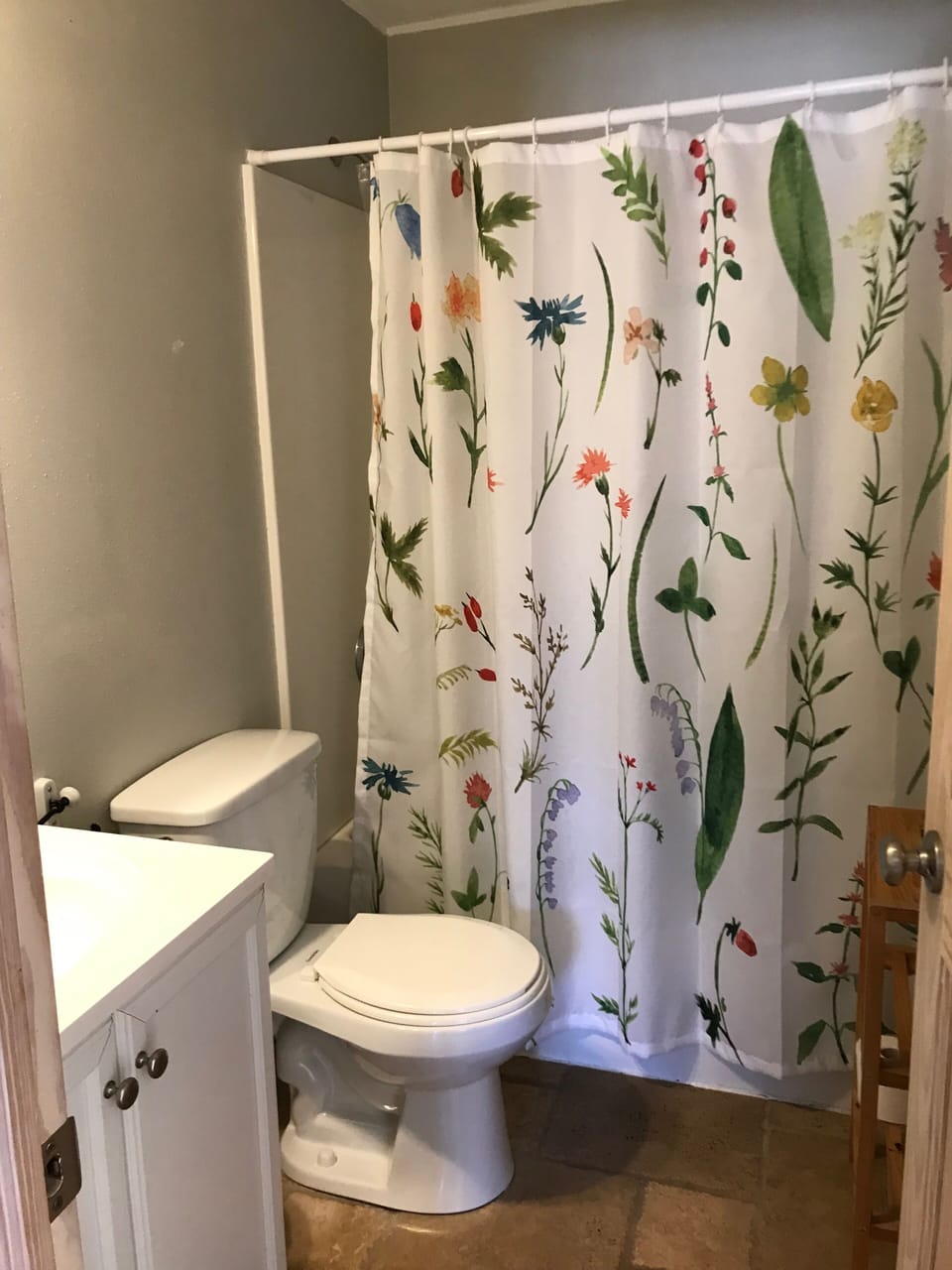 Two full bathrooms, one each wing of the cabin, they are roughly identical. 