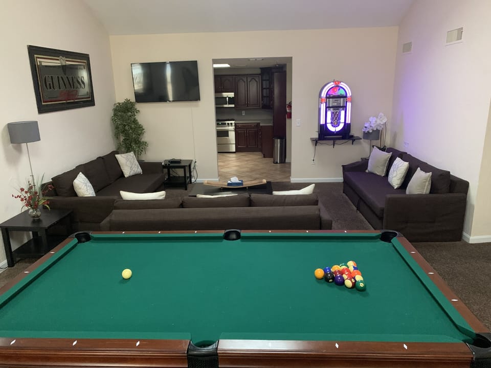 Pool table with ping pong cover.