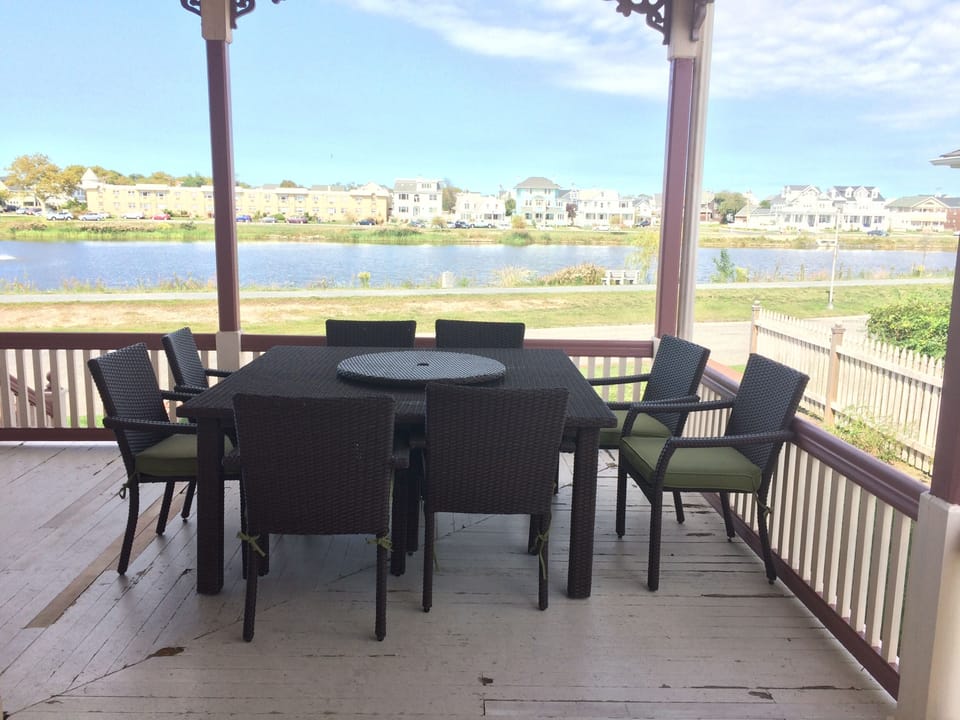 Great eating area on front porch overlook the lake and ocean