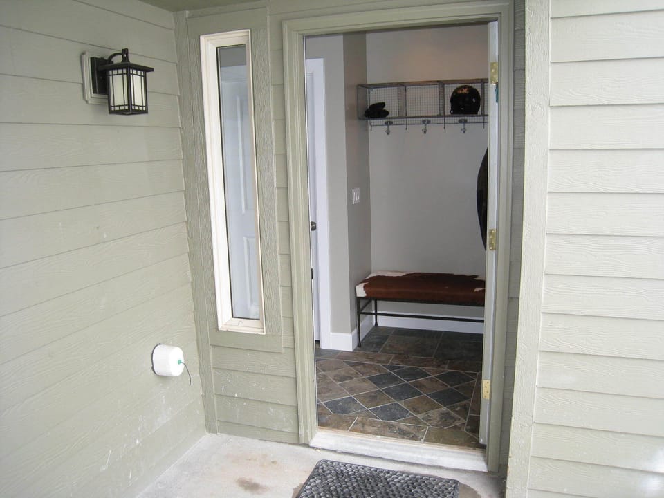 Entry with bench and cubbies, great for taking off and storing ski equipment
