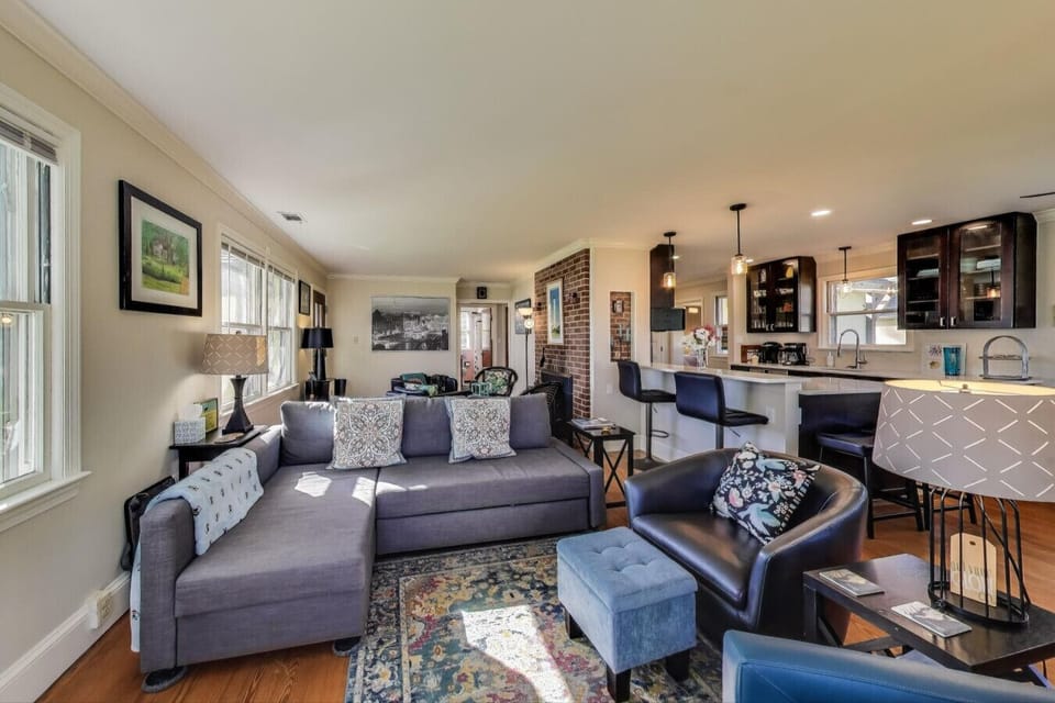 The open layout connects the living room and kitchen, creating an inviting space for your whole group to spend time together.