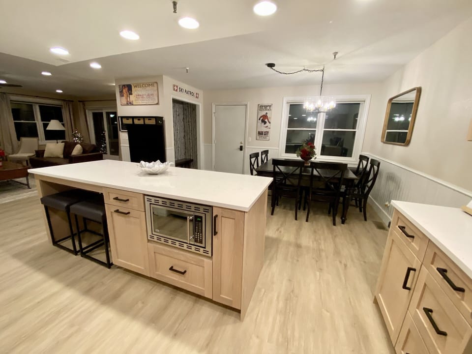 Large 8 foot island w/microwave, trash/recycling drawer & fully stocked kitchen