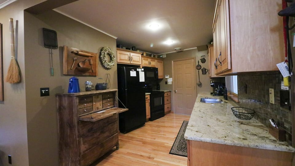 Full Kitchen w/extra fridge in garage