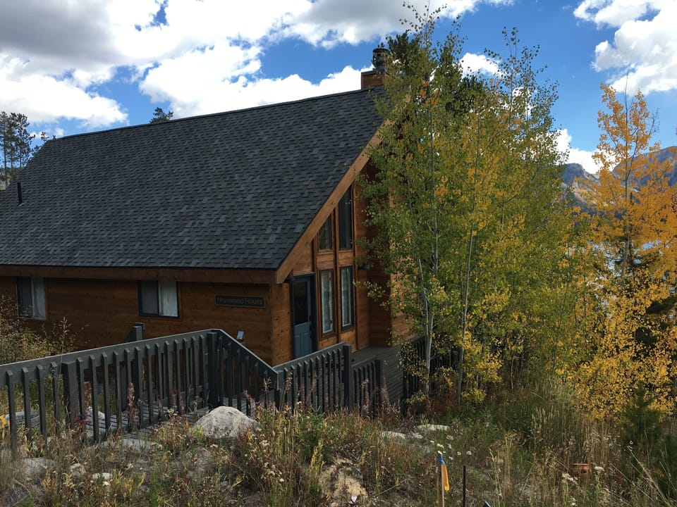 Nestled in the aspen trees. Fully restored exterior with a new roof. 