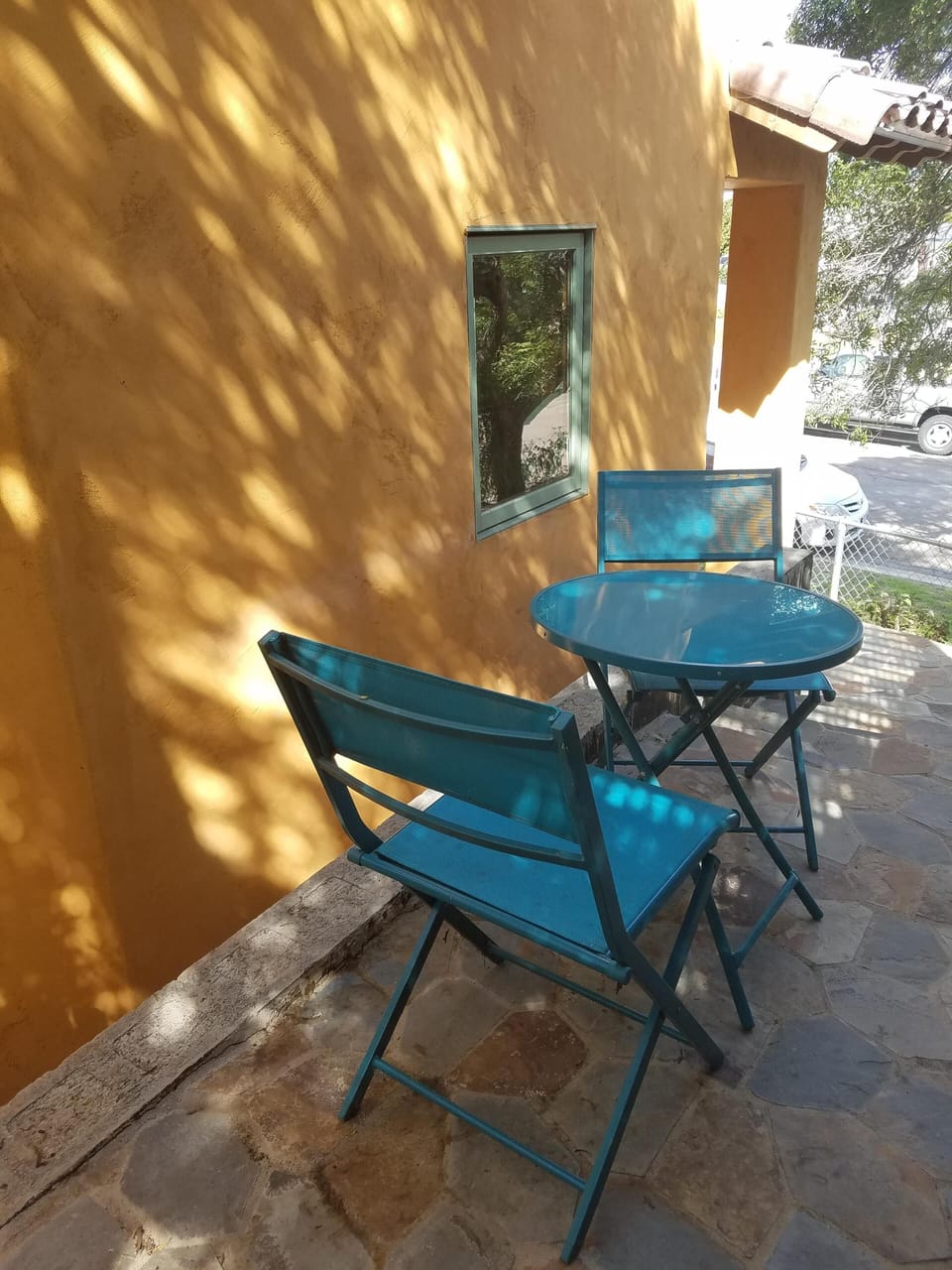 Coffee for two on the patio next to the house