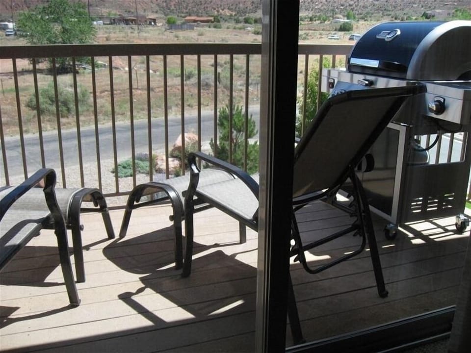 Deck with chairs and grill also a great place to store your bike