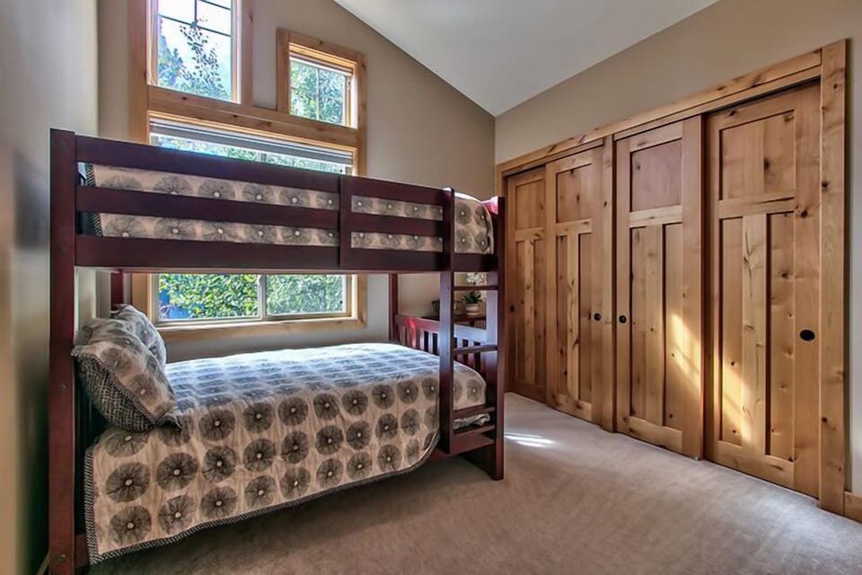 Two Full Size Bunk Beds.  Flooring has been replaced with tile.

