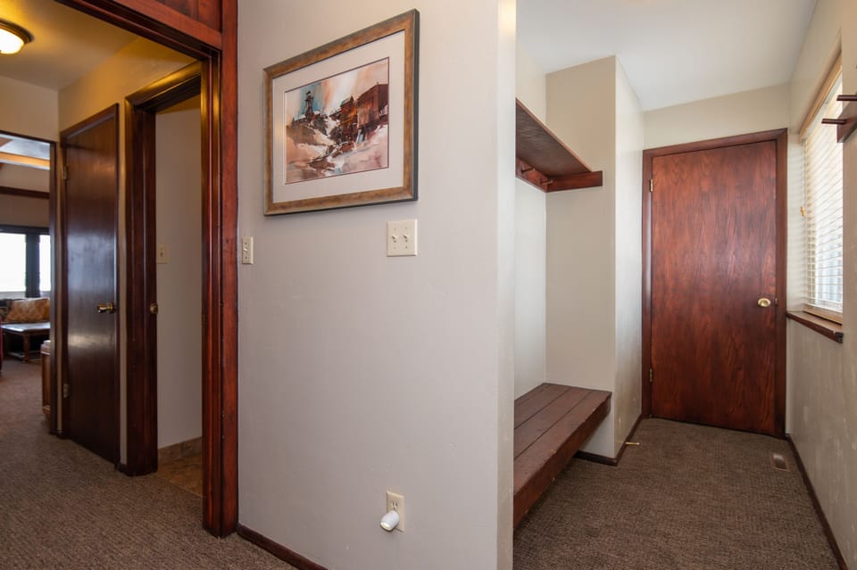 Original Artwork throughout the condo plus a bench to put on your shoes.