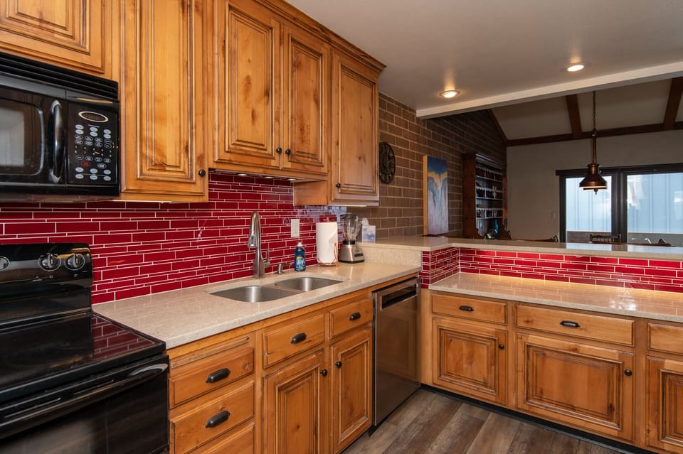 Double oven, new dishwasher. Open to dining and family room.
